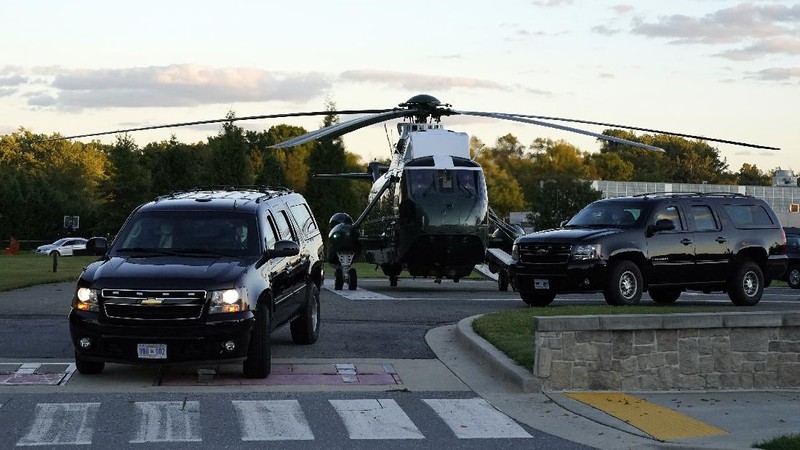 President Donald Trump waves as he leaves the White House to go to Walter Reed National Military Medical Center after he tested positive for COVID-19, Friday, Oct. 2, 2020, in Washington. (AP Photo/Alex Brandon)