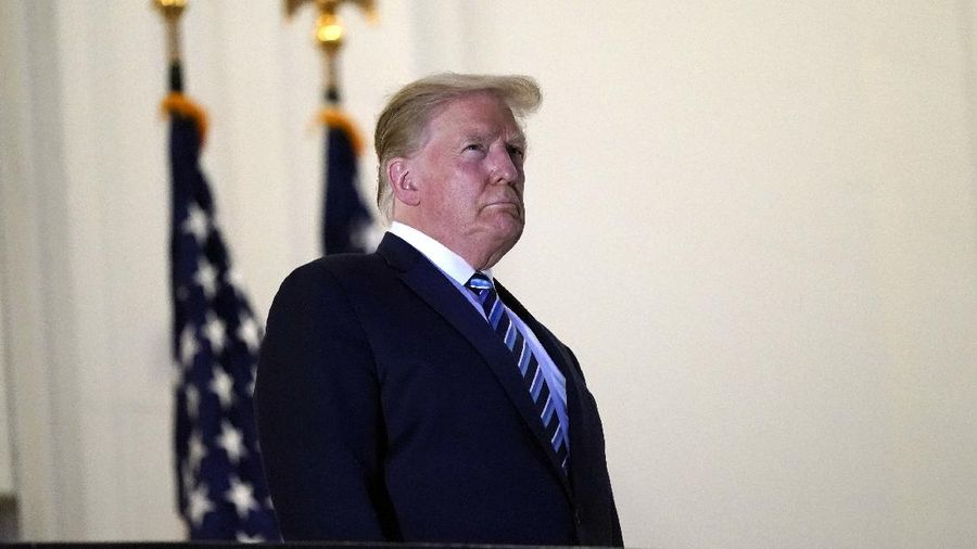 Presiden Amerika Serikat (AS) Donald Trump tidak memakai masker saat berada di Gedung Putih. (AP/Alex Brandon)