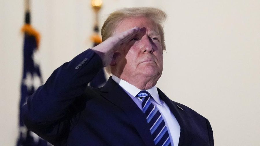 Presiden Amerika Serikat (AS) Donald Trump tidak memakai masker saat berada di Gedung Putih. (AP/Alex Brandon)