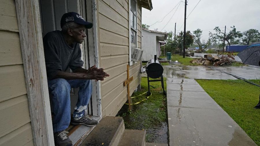 Hujan yang dibawa Badai Delta mengguyur Lafayette, Louisiana, AS, (9/10/2020). (AP/Gerald Herbert)