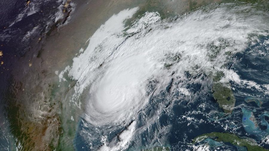 Hujan yang dibawa Badai Delta mengguyur Lafayette, Louisiana, AS, (9/10/2020). (AP/Gerald Herbert)