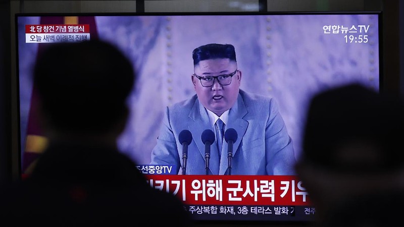 A man watches a TV screen during a news program reporting about the military parade to mark the 75th founding anniversary of the North Korea's ruling Workers' party, at the Seoul Railway Station in Seoul, South Korea, Saturday, Oct. 10, 2020. (AP Photo/Lee Jin-man)