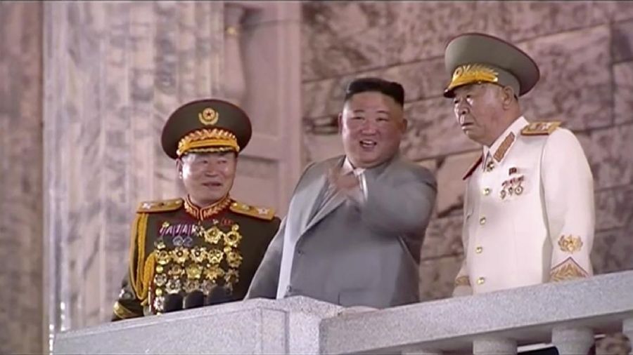 This image made from video broadcasted by North Korea's KRT, shows a military parade with what appears to be a possible new solid-fuel missile at the Kim Il Sung Square in Pyongyang, Saturday, Oct. 10, 2020. North Korean leader Kim Jong Un warned Saturday that his country would “fully mobilize” its nuclear force if threatened as he took center stage at a massive military parade to mark the 75th anniversary of the country’s ruling party. (KRT via AP)
