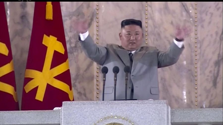 In this image made from video broadcasted by North Korea's KRT on Saturday, Oct. 10, 2020, North Korean leader Kim Jong Un waves during a ceremony to celebrate the 75th anniversary of the country’s ruling party in Pyongyang.(KRT via AP)
