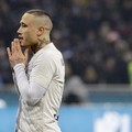 Inter Milan's Radja Nainggolan reacts after missing a a penalty kick during an Italian Cup quarterfinal soccer match between Inter Milan and Lazio at the San Siro stadium, in Milan, Italy, Thursday, Jan. 31, 2019. (AP Photo/Luca Bruno)