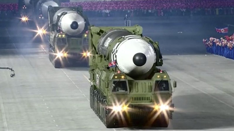 This image made from video broadcasted by North Korea's KRT, shows a military parade with what appears to be a possible new solid-fuel missile at the Kim Il Sung Square in Pyongyang, Saturday, Oct. 10, 2020. North Korean leader Kim Jong Un warned Saturday that his country would “fully mobilize” its nuclear force if threatened as he took center stage at a massive military parade to mark the 75th anniversary of the country’s ruling party. (KRT via AP)