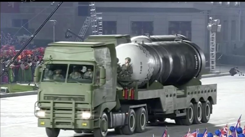 This image made from video broadcasted by North Korea's KRT, shows a military parade with what appears to be a possible new solid-fuel missile at the Kim Il Sung Square in Pyongyang, Saturday, Oct. 10, 2020. North Korean leader Kim Jong Un warned Saturday that his country would “fully mobilize” its nuclear force if threatened as he took center stage at a massive military parade to mark the 75th anniversary of the country’s ruling party. (KRT via AP)