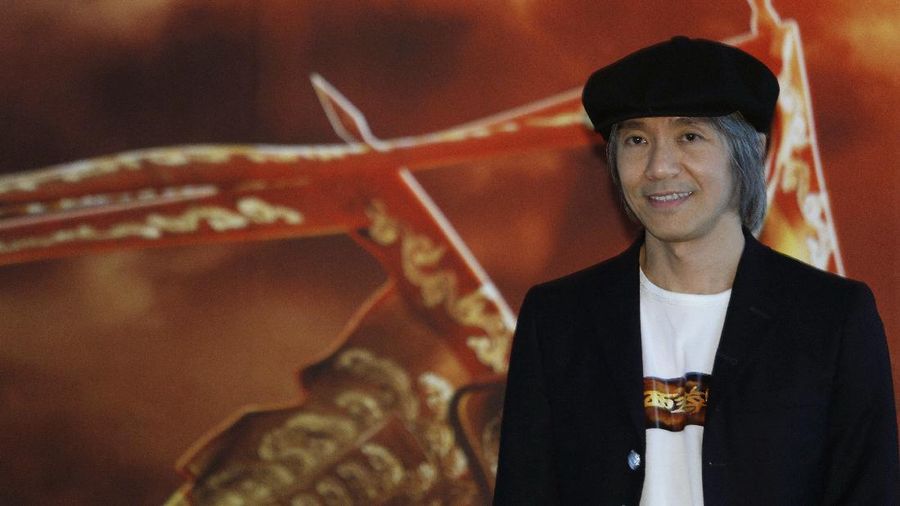 Hong Kong director Stephen Chow smiles during a press conference of his new film