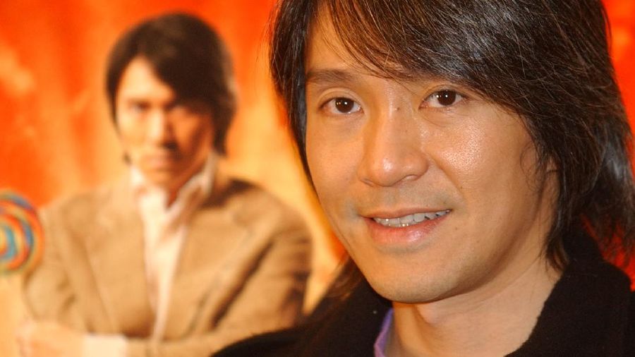 ** FILE ** Hong Kong comedian Stephen Chow poses for media while promoting his new movie 