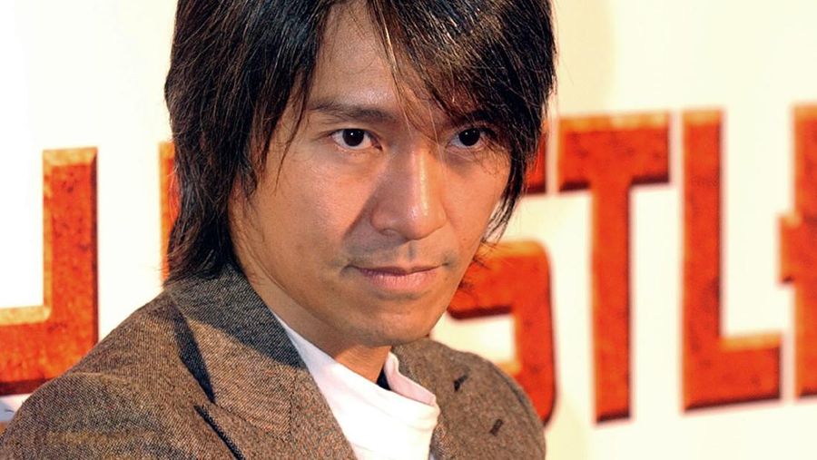 ** FILE ** Hong Kong comedian Stephen Chow poses for media while promoting his new movie 