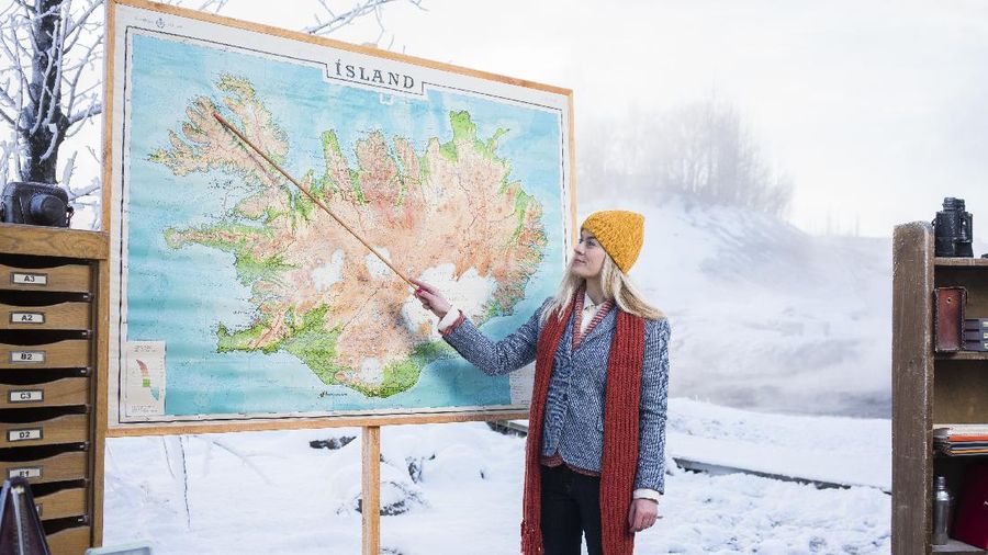 IMAGE DISTRIBUTED FOR INSPIRED BY ICELAND - In this image released on Thursday, Feb. 25, 2016, Stína Bang, certified tour guide and Head of 'Iceland Academy', points out the seven regions of Iceland as part of a new tourism campaign from Inspired By Iceland, 'Iceland Academy'. The tourism campaign is aimed at ensuring a happy and meaningful experience for tourists, whilst raising awareness about how to travel in a safe and responsible way. Press release and media available to download at www.apassignments.com/multimedia-newsroom. (Inspired by Iceland via AP Images)