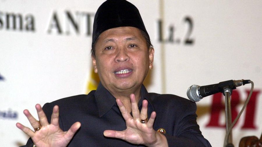 Indonesia's Vice President Hamzah Haz gestures as he speaks at a seminar in Jakarta, Indonesia, Wednesday, Dec. 18, 2002. Haz, a hard-line Islamic politician who has previously defended radicals and denied that Indonesia had a terrorism problem, on Tuesday downplayed his past differences with President Megawati Sukarnoputri saying that Indonesia's government is now united in fighting terrorism. (AP Photo/Muchtar Zakaria)