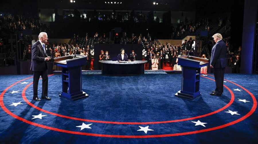 President Donald Trump and Democratic presidential candidate former Vice President Joe Biden participate in the final presidential debate at Belmont University, Thursday, Oct. 22, 2020, in Nashville, Tenn. (Jim Bourg/Pool via AP)