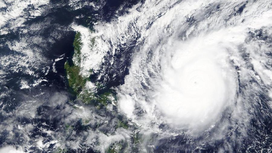 This Saturday, Oct. 31, 2020, satellite image released by NASA Worldview, Earth Observing System Data and Information System (EOSDIS) shows a typhoon locally known as Goni moving around the Philippines. The super typhoon slammed into the eastern Philippines with “catastrophic violent winds” early Sunday and about a million people have been evacuated in its projected path, including in the capital where the main international airport has been ordered closed, officials said. (NASA via AP)