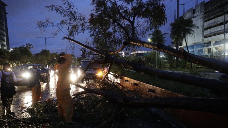 An All-Terrain Vehicle is toppled by strong winds and floods from Typhoon Goni as it hits Daraga, Albay province, central Philippines, Sunday, Nov. 1, 2020. The super typhoon slammed into the eastern Philippines with ferocious winds early Sunday and about a million people have been evacuated in its projected path, including in the capital where the main international airport was ordered closed. (AP Photo)
