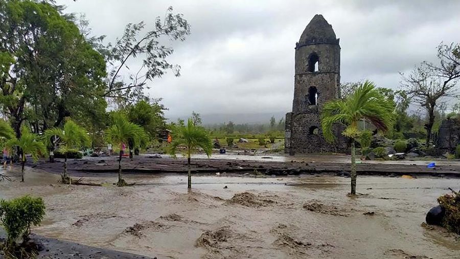 An All-Terrain Vehicle is toppled by strong winds and floods from Typhoon Goni as it hits Daraga, Albay province, central Philippines, Sunday, Nov. 1, 2020. The super typhoon slammed into the eastern Philippines with ferocious winds early Sunday and about a million people have been evacuated in its projected path, including in the capital where the main international airport was ordered closed. (AP Photo)