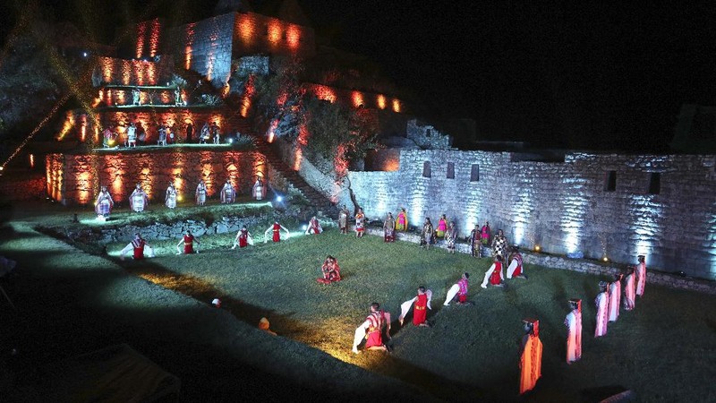 Tourists visit the world-renowned Incan citadel of Machu Picchu as it reopens for the first time since its 8-months-long closure to help curb the spread of COVID-19, in the department of Cusco, Peru, Sunday, Nov. 1, 2020. (AP Photo/Martin Mejia)