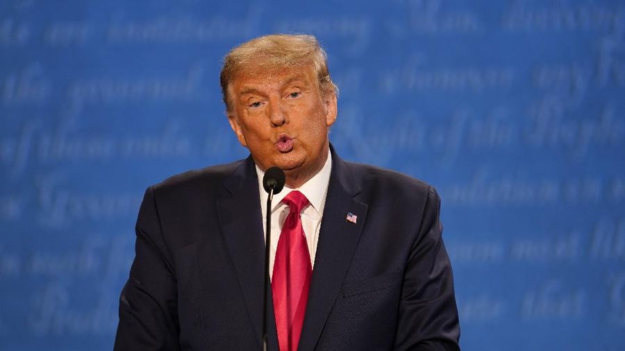 Republican candidate President Donald Trump participates during the second and final presidential debate with Democratic presidential candidate former Vice President Joe Biden Thursday, Oct. 22, 2020, at Belmont University in Nashville, Tenn., with (AP Photo/Julio Cortez)