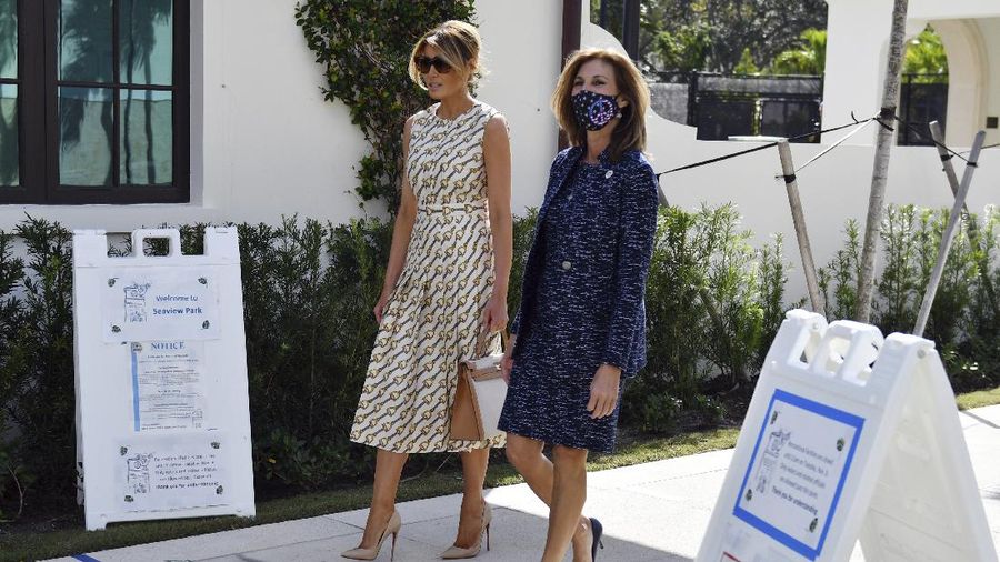 First lady Melania Trump arrives to vote at the Morton and Barbara Mandel Recreation Center, Tuesday, Nov. 3, 2020, in Palm Beach, Fla. (AP Photo/Jim Rassol)