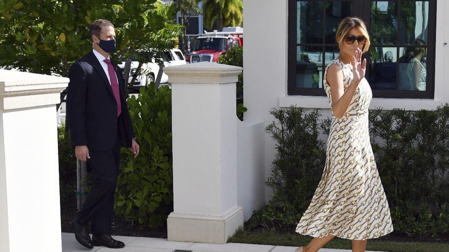 First lady Melania Trump arrives to vote at the Morton and Barbara Mandel Recreation Center, Tuesday, Nov. 3, 2020, in Palm Beach, Fla. (AP Photo/Jim Rassol)