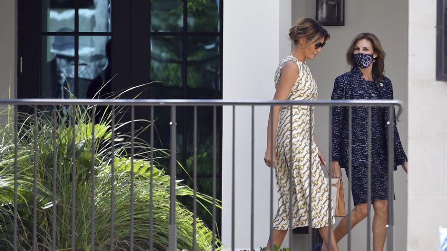 First lady Melania Trump arrives to vote at the Morton and Barbara Mandel Recreation Center, Tuesday, Nov. 3, 2020, in Palm Beach, Fla. (AP Photo/Jim Rassol)