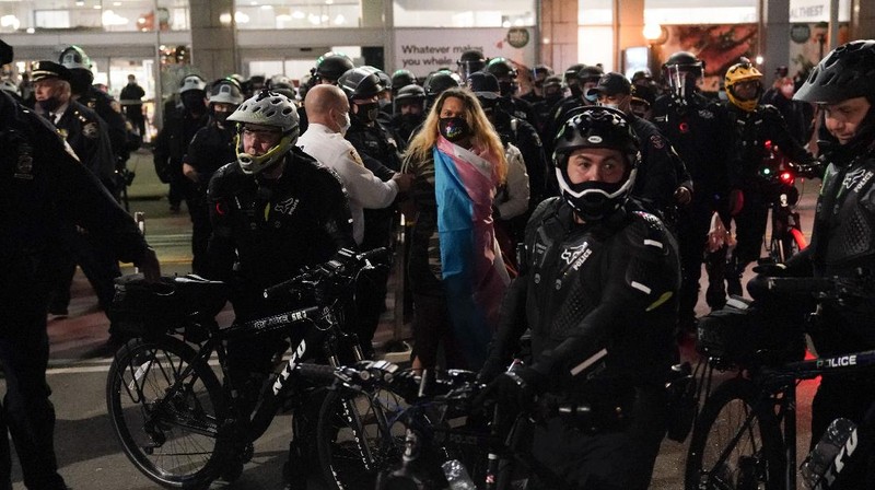 New York Police bike patrol officers make an arrest during a demonstration, Thursday, Nov. 5, 2020, in New York. (AP Photo/Seth Wenig)