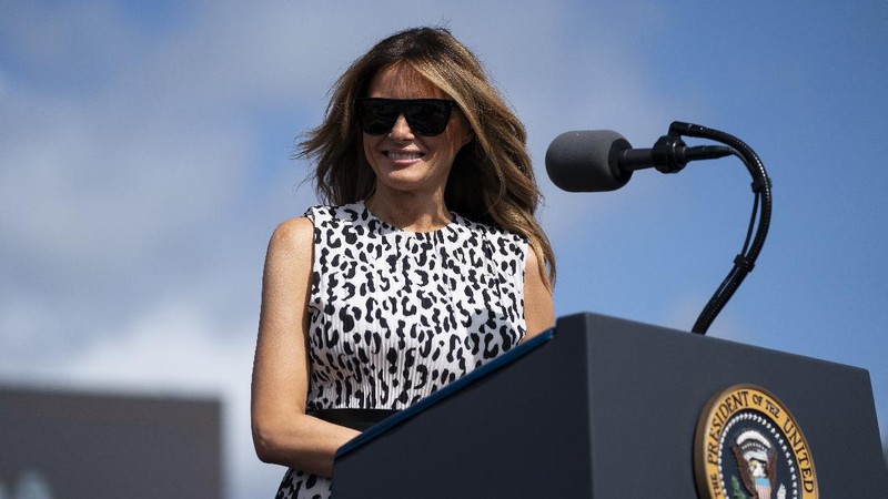First lady Melania Trump waves to supporters as she exits the stage at Whitewoods in Hollenback Twp., Pa. Saturday, Oct. 31, 2020. (Sean McKeag/The Citizens' Voice via AP)