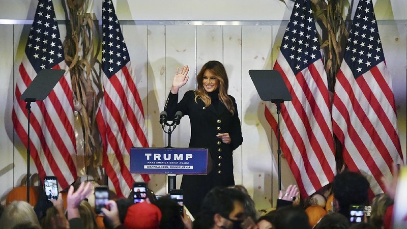 First lady Melania Trump waves to supporters as she exits the stage at Whitewoods in Hollenback Twp., Pa. Saturday, Oct. 31, 2020. (Sean McKeag/The Citizens' Voice via AP)
