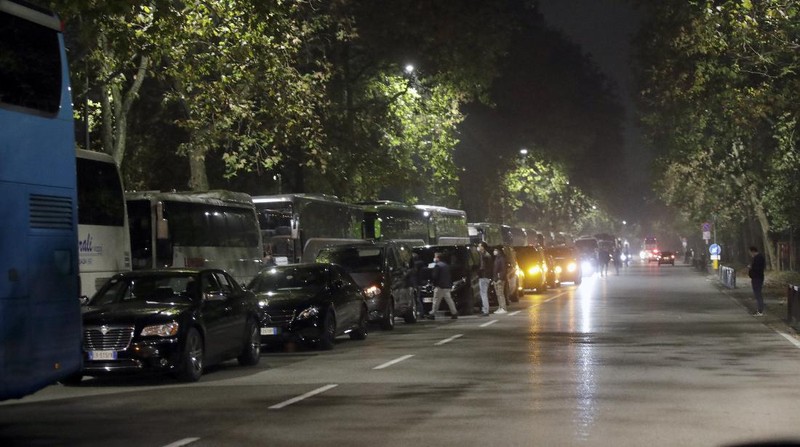 Taxi drivers stage a protest against limitations and the curfew imposed by the government in the effort to curb COVID-19 spread, in Rome Friday, Nov. 6, 2020. (AP Photo/Andrew Medichini)