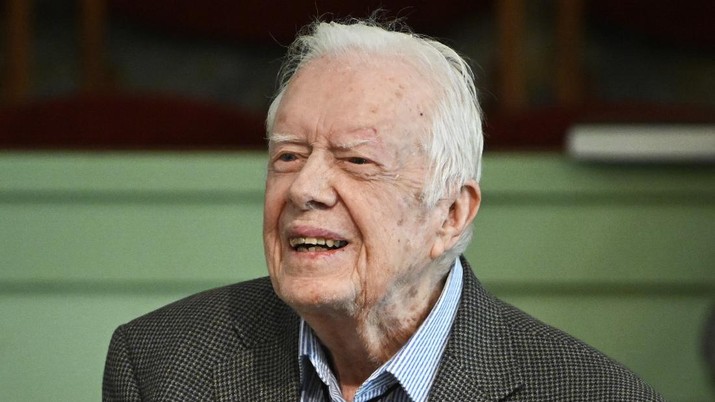 FILE - In this Nov. 3, 2019 file photo, former President Jimmy Carter teaches Sunday school at Maranatha Baptist Church in Plains, Ga. Carter was released from Emory University Hospital on Wednesday, Nov. 27, after recovering from surgery to relieve pressure on his brain caused by bleeding from a fall. Carter Center spokeswoman Deanna Congileo said the Carters “look forward to enjoying Thanksgiving at home in Plains, where he will continue to recover.” (AP Photo/John Amis, File)