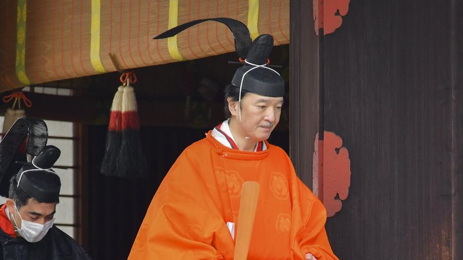In this photo provided by the Imperial Household Agency of Japan, Japan's Crown Prince Akishino attends a ceremony after he was formally proclaimed the first in line to the Chrysanthemum Throne at the Imperial Palace in Tokyo, Sunday, Nov. 8, 2020. Akishisho, Emperor Naruhito's younger brother, was formally sworn in as first in line to the Chrysanthemum Throne in a traditional palace ritual that has been postponed for seven month and scaled down due to the coronavirus pandemic. (Imperial Household Agency of Japan via AP)