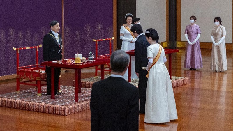 In this photo provided by the Imperial Household Agency of Japan, Japan's Crown Prince Akishino and his wife Crown Princess Kiko attend a ceremony after Akishino was formally proclaimed the first in line to the Chrysanthemum Throne, at the Imperial Palace in Tokyo, Sunday, Nov. 8, 2020. Akishisho, Emperor Naruhito's younger brother, was formally sworn in as first in line to the Chrysanthemum Throne in a traditional palace ritual that has been postponed for seven month and scaled down due to the coronavirus pandemic. (Imperial Household Agency of Japan via AP)