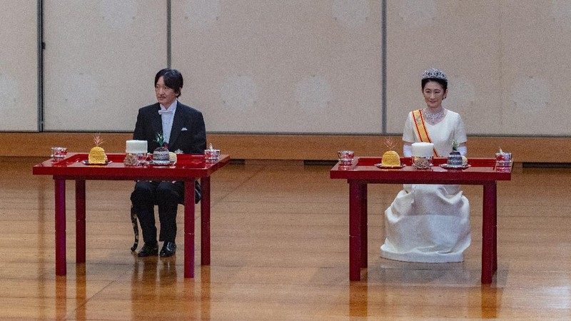 In this photo provided by the Imperial Household Agency of Japan, Japan's Crown Prince Akishino and his wife Crown Princess Kiko attend a ceremony after Akishino was formally proclaimed the first in line to the Chrysanthemum Throne, at the Imperial Palace in Tokyo, Sunday, Nov. 8, 2020. Akishisho, Emperor Naruhito's younger brother, was formally sworn in as first in line to the Chrysanthemum Throne in a traditional palace ritual that has been postponed for seven month and scaled down due to the coronavirus pandemic. (Imperial Household Agency of Japan via AP)