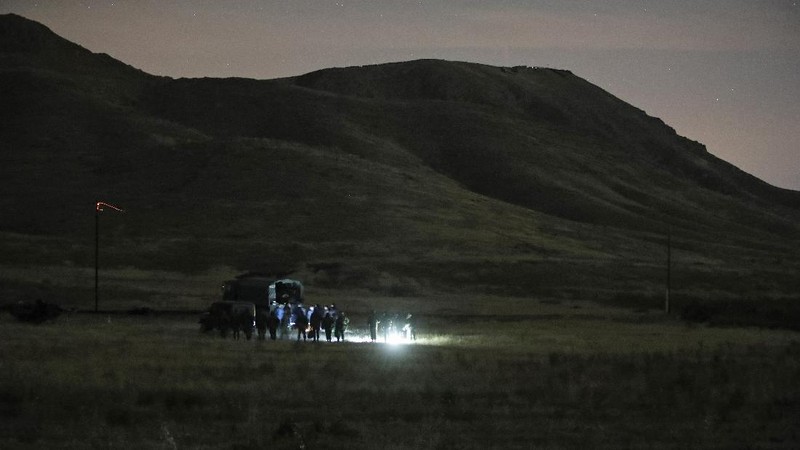 In this handout photo released by Armenian Emergency Ministry Press Office on Monday, Nov. 9, 2020, shows wreckage of a downed Russian military helicopter which was shot down in Armenia near the border with Azerbaijan. Two servicemen were killed, but the Russian Defense Ministry said the aircraft was outside the conflict area. The helicopter was downed near the border with Nakhcivan, an exclave of Azerbaijan surrounded by Armenia, Turkey and Iran. It was not clear who shot it down. (Armenian Emergency Ministry Press Office via AP)