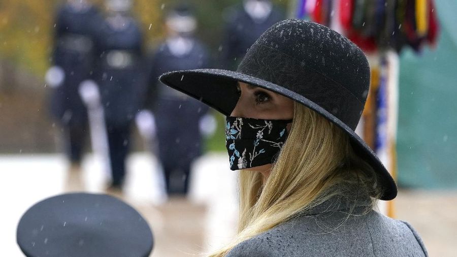 President Donald Trump participates in a Veterans Day wreath laying ceremony at the Tomb of the Unknown Soldier at Arlington National Cemetery in Arlington, Va., Wednesday, Nov. 11, 2020. (AP Photo/Patrick Semansky)