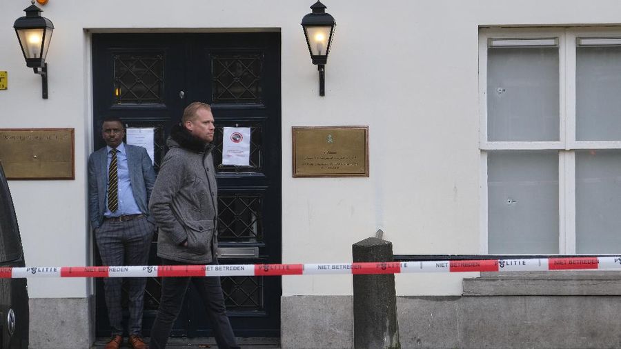 Bullet impacts are seen in the windows of Saudi Arabia's embassy in The Hague, Netherlands, Thursday, Nov. 12, 2020, after several shot were fired at the building early in the morning. Nobody was injured and police were investigating. (AP Photo/Mike Corder)