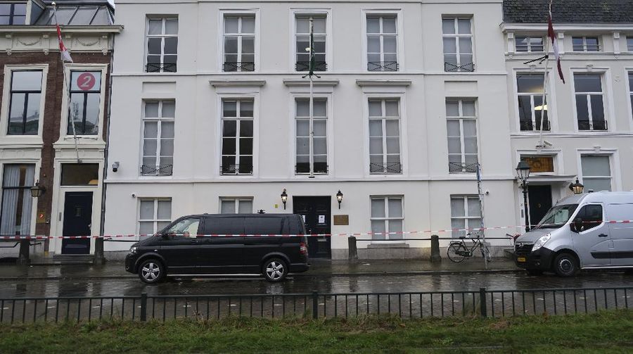 Bullet impacts are seen in the windows of Saudi Arabia's embassy in The Hague, Netherlands, Thursday, Nov. 12, 2020, after several shot were fired at the building early in the morning. Nobody was injured and police were investigating. (AP Photo/Mike Corder)