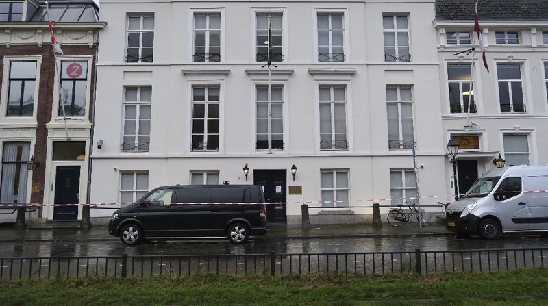 Bullet impacts are seen in the windows of Saudi Arabia's embassy in The Hague, Netherlands, Thursday, Nov. 12, 2020, after several shot were fired at the building early in the morning. Nobody was injured and police were investigating. (AP Photo/Mike Corder)