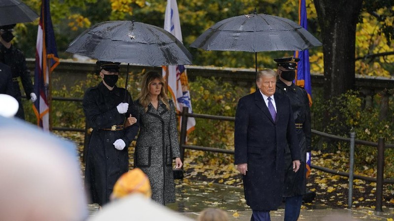 President Donald Trump participates in a Veterans Day wreath laying ceremony at the Tomb of the Unknown Soldier at Arlington National Cemetery in Arlington, Va., Wednesday, Nov. 11, 2020. (AP Photo/Patrick Semansky)