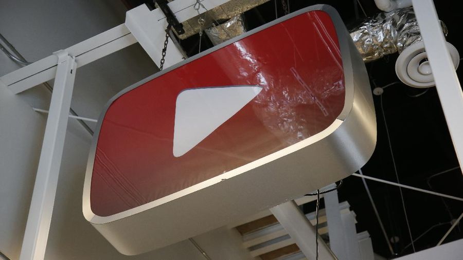 A logo hangs from the ceiling in the YouTube Space LA offices production equipment room Wednesday, Oct. 21, 2015, in Los Angeles. (AP Photo/Danny Moloshok)