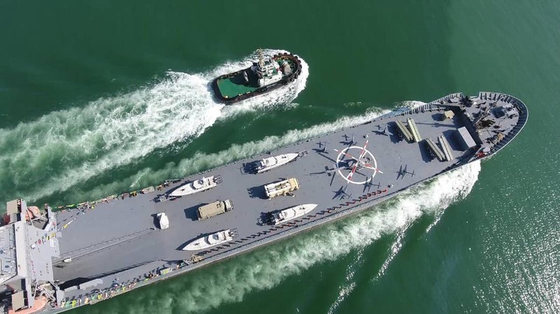 In this photo released Thursday, Nov. 19, 2020, by the Iranian Revolutionary Guard, the Guard's warship named after slain Guard naval commander Abdollah Roudaki, sails in to the Iranian southern territorial waters. Iran's paramilitary Revolutionary Guard said it launched a heavy warship Thursday capable of carrying helicopters, drones and missile launchers amid ongoing tensions with the U.S. (Sepahnews via AP)