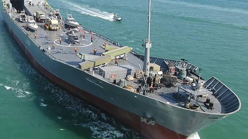 In this photo released Thursday, Nov. 19, 2020, by the Iranian Revolutionary Guard, the Guard's warship named after slain Guard naval commander Abdollah Roudaki, sails in to the Iranian southern territorial waters. Iran's paramilitary Revolutionary Guard said it launched a heavy warship Thursday capable of carrying helicopters, drones and missile launchers amid ongoing tensions with the U.S. (Sepahnews via AP)