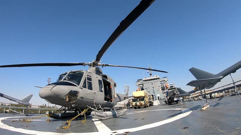 In this photo released Thursday, Nov. 19, 2020, by the Iranian Revolutionary Guard, the Guard's warship named after slain Guard naval commander Abdollah Roudaki, sails in to the Iranian southern territorial waters. Iran's paramilitary Revolutionary Guard said it launched a heavy warship Thursday capable of carrying helicopters, drones and missile launchers amid ongoing tensions with the U.S. (Sepahnews via AP)