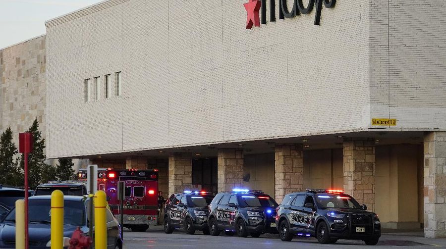 Police officials walk to the Mayfair Mall, Friday, Nov. 20, 2020, in Wauwatosa, Wis. Multiple people were shot Friday afternoon at the mall and police are still searching for the shooter. (AP Photo/Nam Y. Huh)