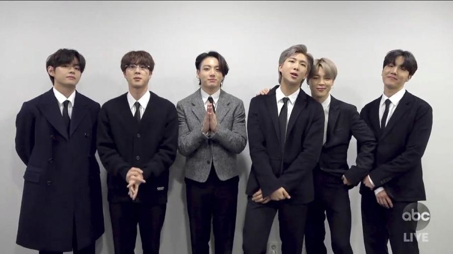 In this screen shot provided by ABC on Sunday, Nov. 22, 2020, BTS accepts the award for favorite pop/rock duo or group at the American Music Awards at the Microsoft Theater in Los Angeles. (ABC via AP)