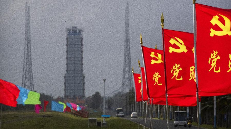 FILE - In this July 17, 2020, photo released by China's Xinhua News Agency, a Long March-5 rocket is seen at the Wenchang Space Launch Center in southern China's Hainan Province. Chinese technicians were making final preparations Monday, Nov. 23, 2020, to launch a Long March-5 rocket carrying a mission to bring back material from the lunar surface in a potentially major advance for the country's space program. (Zhang Gaoxiang/Xinhua via AP, File)