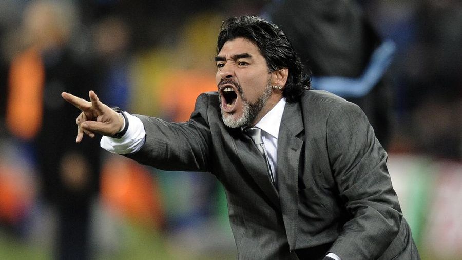 FILE - In this June 27, 2010 file photo, Argentina head coach Diego Maradona gestures during the World Cup round of 16 soccer match between Argentina and Mexico at Soccer City in Johannesburg, South Africa. The Argentine soccer great who was among the best players ever and who led his country to the 1986 World Cup title before later struggling with cocaine use and obesity, died from a heart attack on Wednesday, Nov. 25, 2020, at his home in Buenos Aires. He was 60. (AP Photo/Martin Meissner, File)