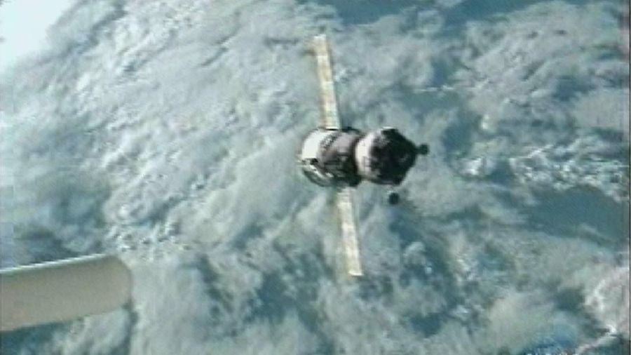 A Russian Soyuz capsule carrying the Expedition 12 crew prepares to dock with the International Space Station in this image from television Monday, Oct. 3, 2005.  The crew Commander William McArthur and Flight Engineer Valery Tokarev are joined by American businessman Gregory Olsen, who will spend 10 days in space as part of a commercial contract with the Russian Federal Space Agency.  (AP Photo/NASA TV)