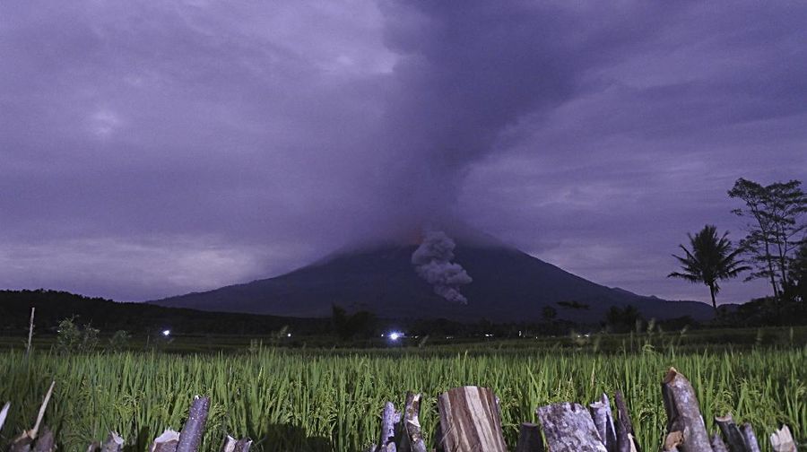 Volcanic materials spew from the crater of Mount Semeru in Lumajang, East Java, Indonesia, Tuesday, Dec. 1, 2020. Indonesian authorities are closely monitoring several volcanoes after sensors picked up increased activity in recent weeks, prompting the evacuation of thousands of people. (AP Photo)