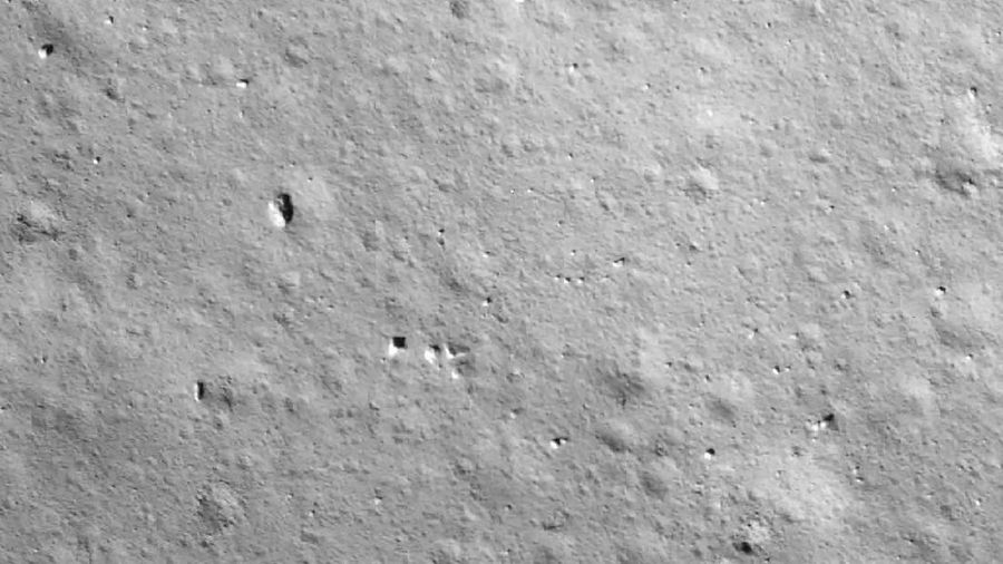 This image taken by camera aboard Chang'e-5 spacecraft provided by China National Space Administration shows a moon surface during its landing process Tuesday, Dec. 1, 2020. The Chinese spacecraft landed on the moon Tuesday to bring back lunar rocks to Earth for the first time since the 1970s, the government announced. (China National Space Administration via AP)